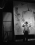 Saul Steinberg posing in front of his mural.jpg (151331 bytes)